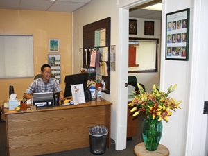 Our reception desk-where you will be greeted by a friendly receptionist who can answer your questions and get you started in the process of meeting with a therapist