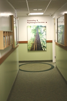 Turn right at the top of the stairs and walk down the hallway. Our reception desk is at the end of the hall on the right hand side