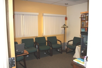 Here is a view of our waiting room. We have two lovely fish tanks (not pictured). The fish are a great source of amusement and relaxation